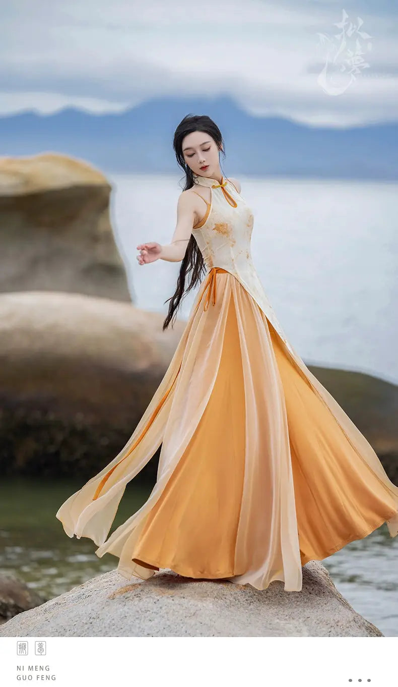 Flowing cheongsam dress with orange accents by the sea