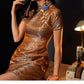 Elegant brocade cheongsam paired with statement earrings and lamp decor.