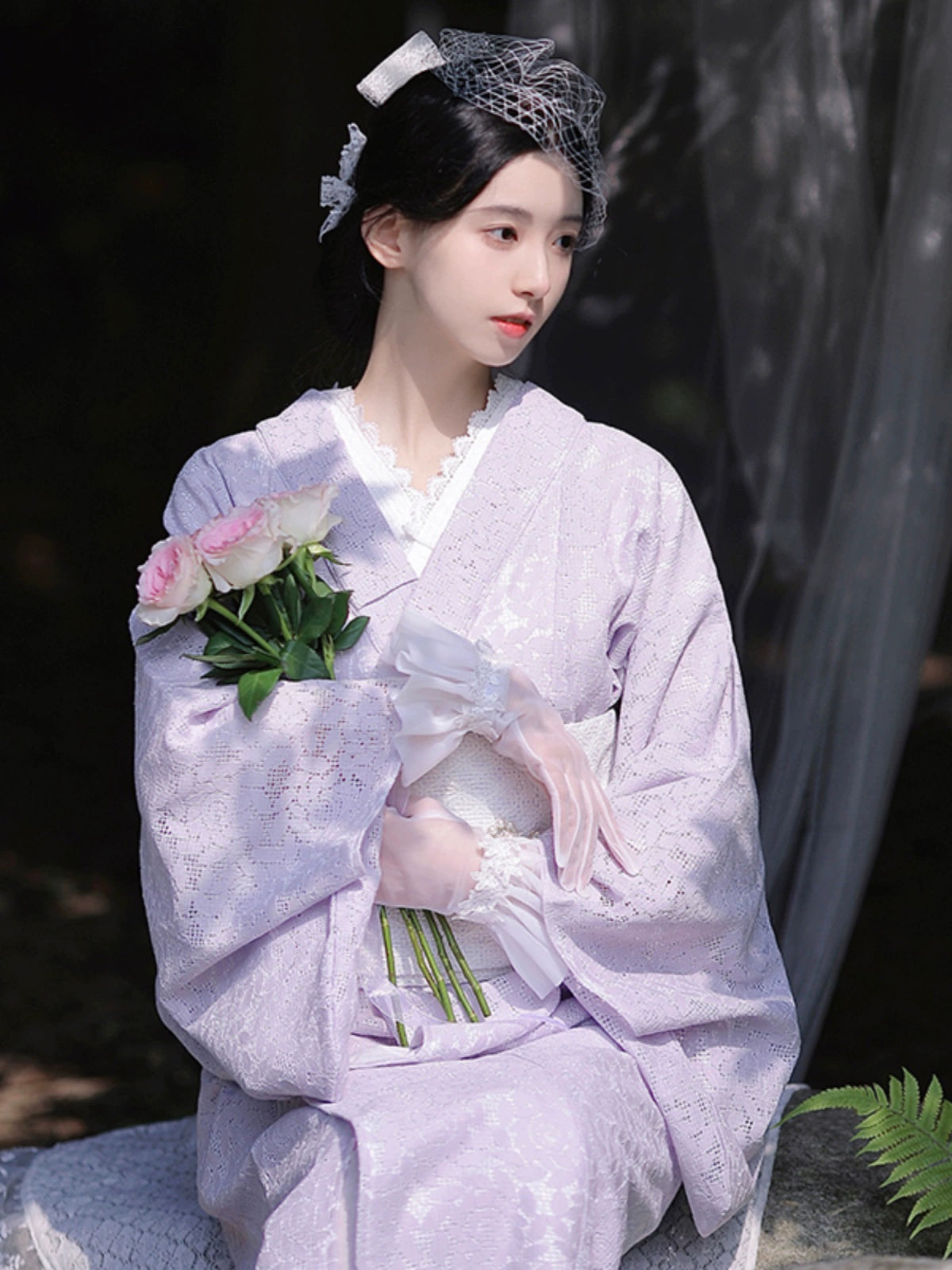 Purple lace kimono paired with gloves and a bouquet of roses.