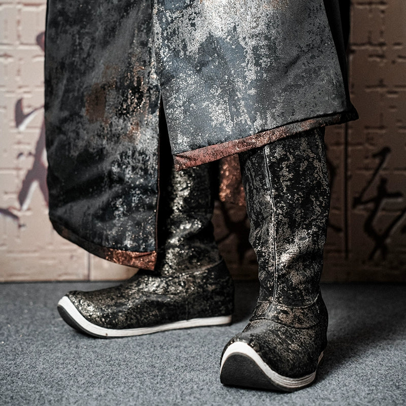 Traditional gilt boots with a textured metallic finish, inspired by Ming dynasty Hanfu style, paired with ancient clothing for men and women.