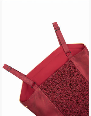 Back view of bodice with adjustable straps and shirred panel on [Dan Que Acacia] New Chinese Style Red Wedding Dress.