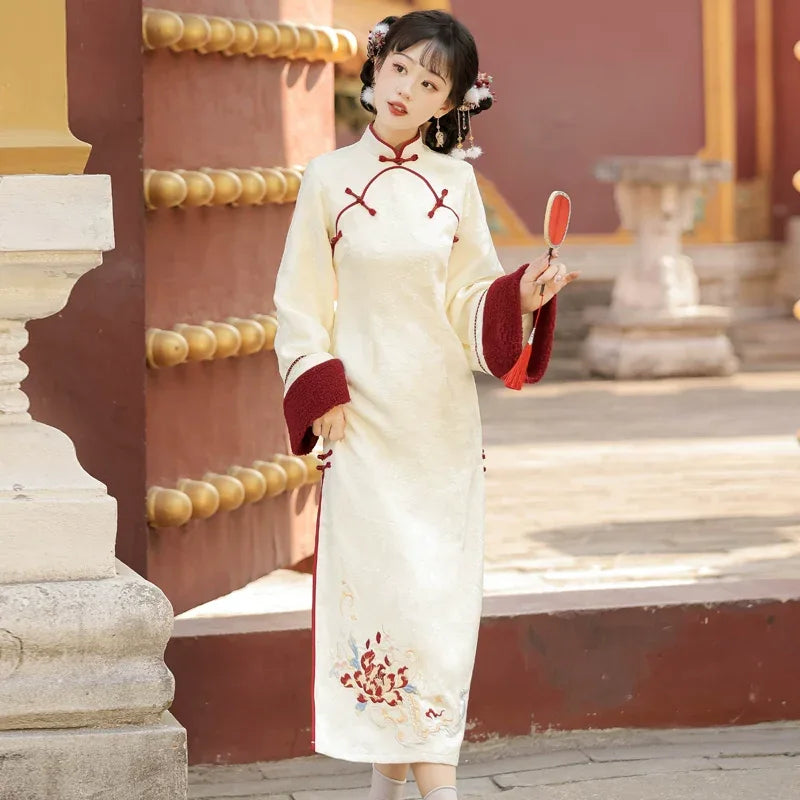 chinese traditional dress short Chinese Woman in Short White Patterned Traditional Dress Staring To Her Right Stock Image