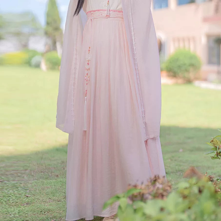 Peach Early Summer pink pleated skirt and waist detail