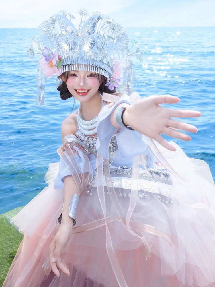 Playful pose in Pink Miao Clothing Women's Summer Cake Green Dress with detailed silver accessories and layered pink skirt.