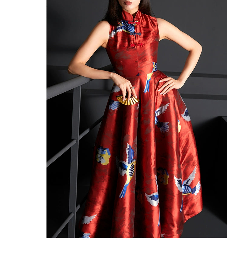 Elegant red brocade cheongsam dress with a high neckline and vibrant patterns.