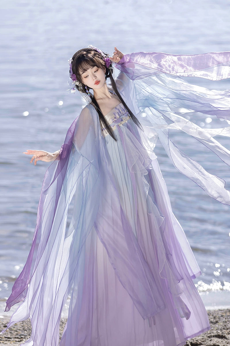 Step into the elegance of Tang Dynasty fashion with our Princess Dress Hanfu. This exquisite purple Hanfu features delicate fairy embroidery, capturing the timeless beauty of ancient Chinese attire. Explore our collection of traditional dresses, accessories, and sewing patterns, designed to celebrate the rich heritage of Hanfu fashion. Elevate your style and embrace the allure of classical Chinese elegance with our Princess Dress Hanfu.