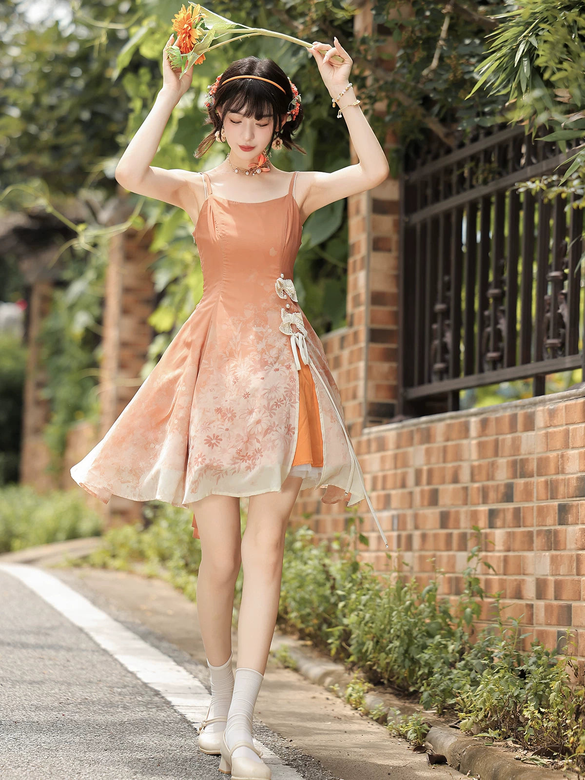 Full length view of the peach floral dress without the outer layer