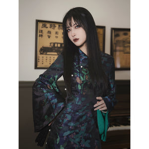 Stylish black cheongsam dress featuring green floral jacquard patterns, half sleeves, and a slim fit. Made from polyester, viscose, and cotton blend.