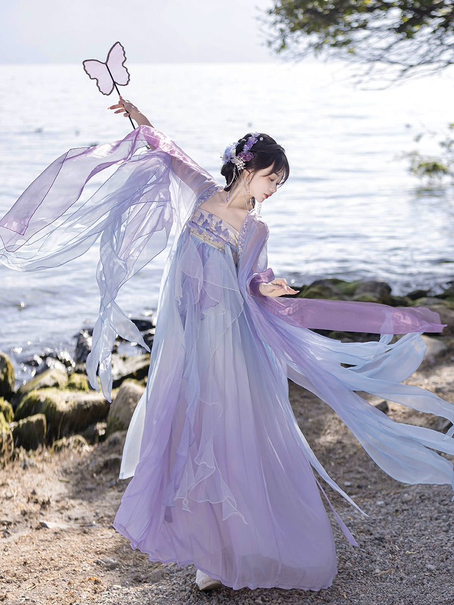 Step into the elegance of Tang Dynasty fashion with our Princess Dress Hanfu. This exquisite purple Hanfu features delicate fairy embroidery, capturing the timeless beauty of ancient Chinese attire. Explore our collection of traditional dresses, accessories, and sewing patterns, designed to celebrate the rich heritage of Hanfu fashion. Elevate your style and embrace the allure of classical Chinese elegance with our Princess Dress Hanfu.