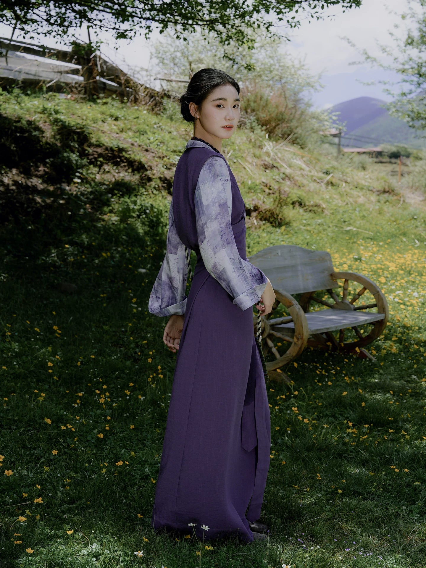 Purple Tibetan style long dress with floral print sleeves front view