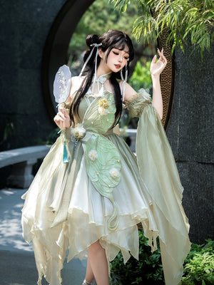 Close-up of Green Lolita Dress with butterfly embroidery and flower details, showcasing intricate craftsmanship and summer charm.
