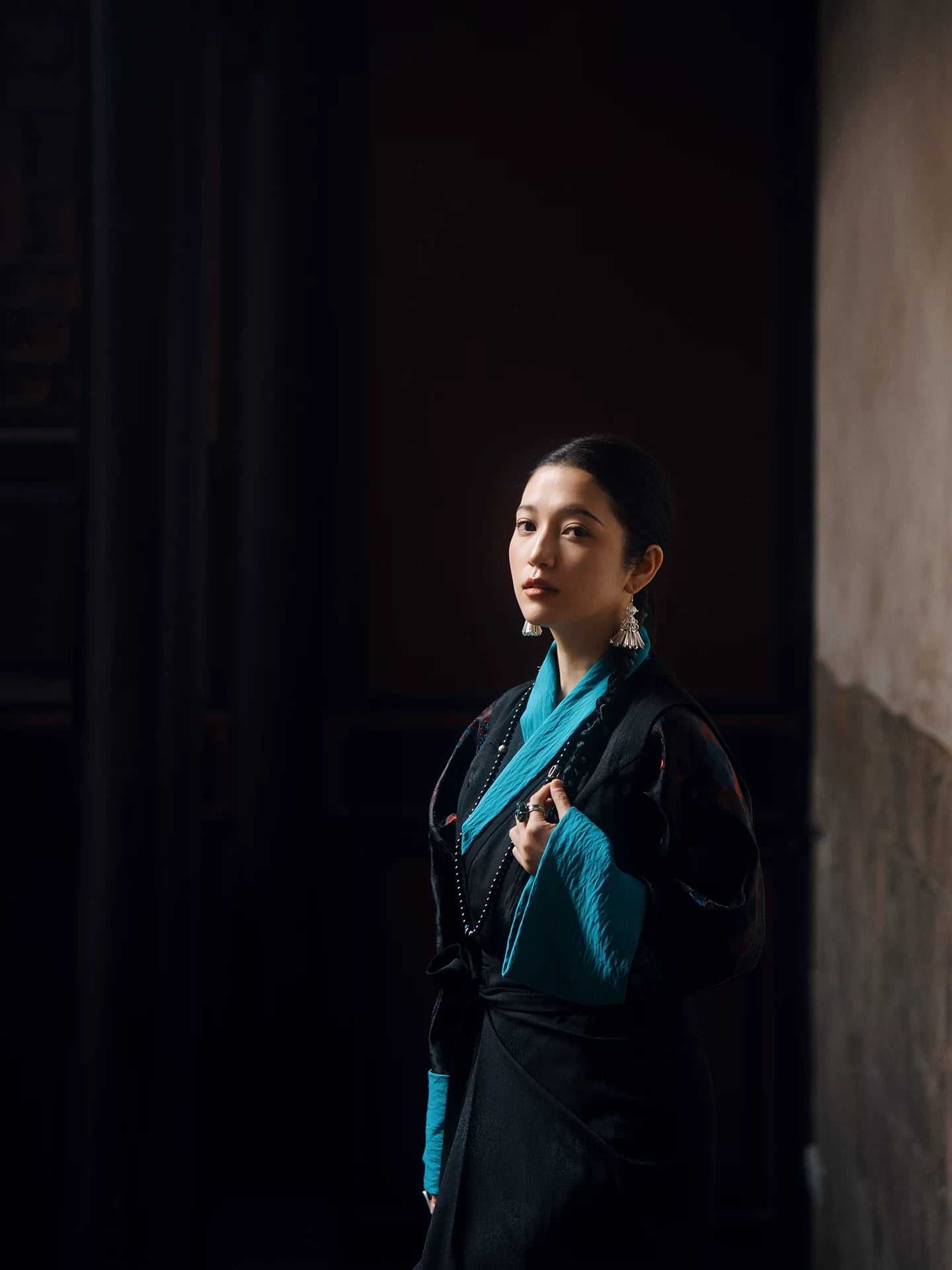 Long black Lhasa-style dress separates with floral sleeve detail