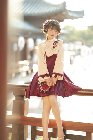 Modern Lolita cheongsam with cream top, burgundy pleated skirt, floral embroidery, and elegant Han element design.