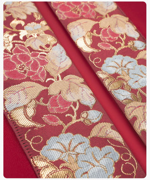 Gold floral embroidery on red fabric of [Dan Que Acacia] New Chinese Style Red Wedding Dress highlighting luxurious design.
