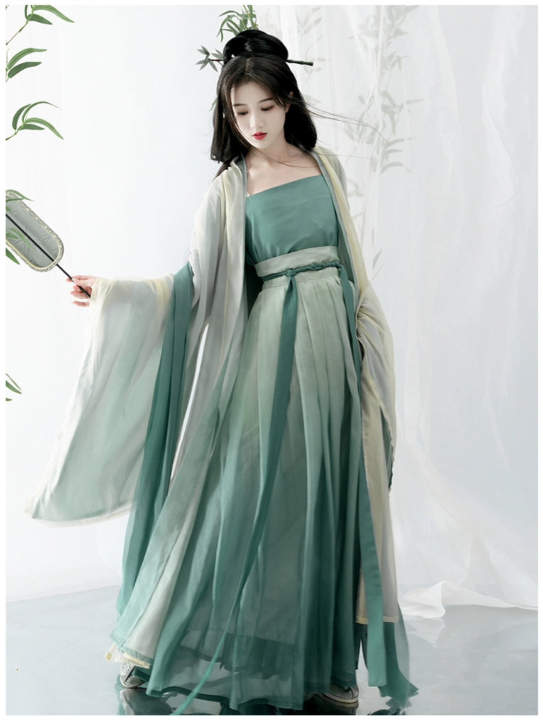 Elevate your style with our Hanfu Women's Green Daily Long Gown Wrap Skirt, inspired by the majestic beauty of the Song Dynasty. Explore our collection featuring Song Dynasty Hanfu, Hanfu skirts, and Hanfu shirts. Discover casual and princess-inspired Hanfu outfits, complemented by Dunhuang-inspired designs. Experience the allure of traditional Hanfu fashion with vibrant green hues and exquisite detailing.