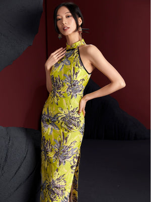 Elegant sleeveless gold bamboo cheongsam with purple floral jacquard design, halter neck, and mid-length cut. Non-stretch brocade fabric.