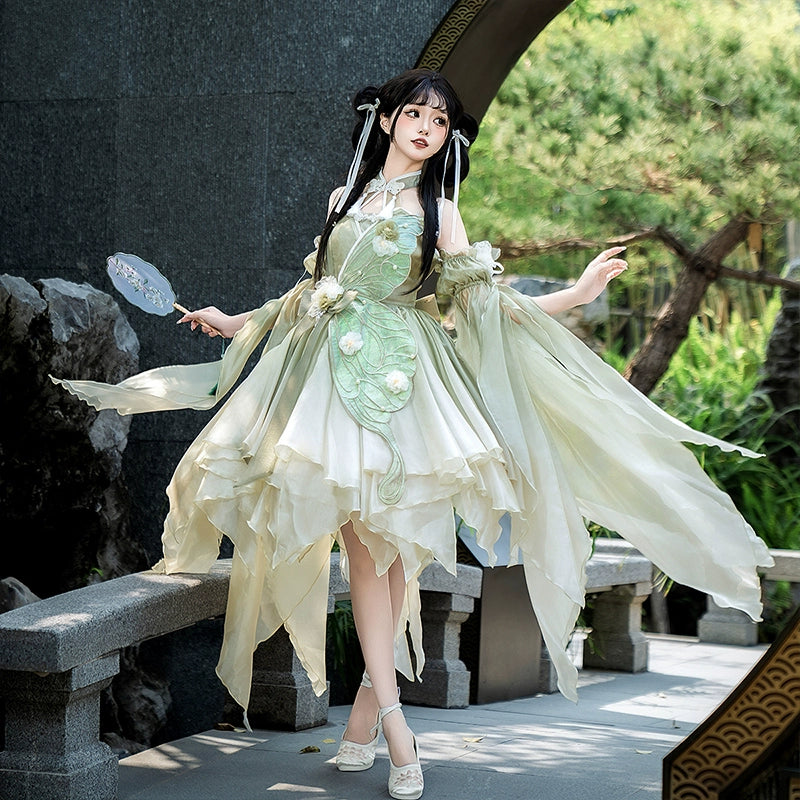 Model posing in Flower Marriage Green Lolita Dress with fan, highlighting the dress’s flowing chiffon and floral details.