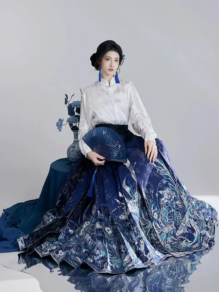 This blue modern hanfu features elegant hanfu sleeves, a stylish hanfu jacket, and timeless charm. Perfect as a princess hanfu dress, fairy hanfu dress, or casual hanfu, it suits every hanfu woman. Inspired by Ming Dynasty hanfu, this modern hanfu dress pairs beautifully with a hanfu shirt for a layered look. Ideal for hanfu cosplay or as a cozy winter hanfu, it’s available at our trusted hanfu shop. Wondering where to buy hanfu? Find the best modernised hanfu and blue hanfu designs here.