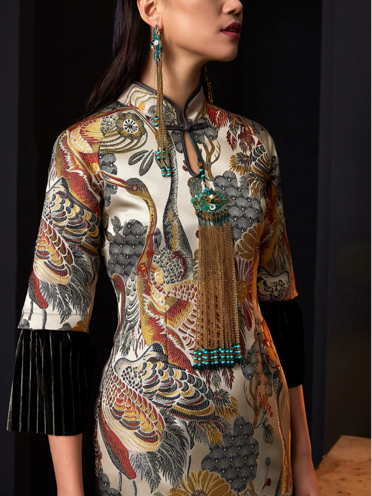 Close-up of cheongsam jacquard dress showcasing intricate floral details.