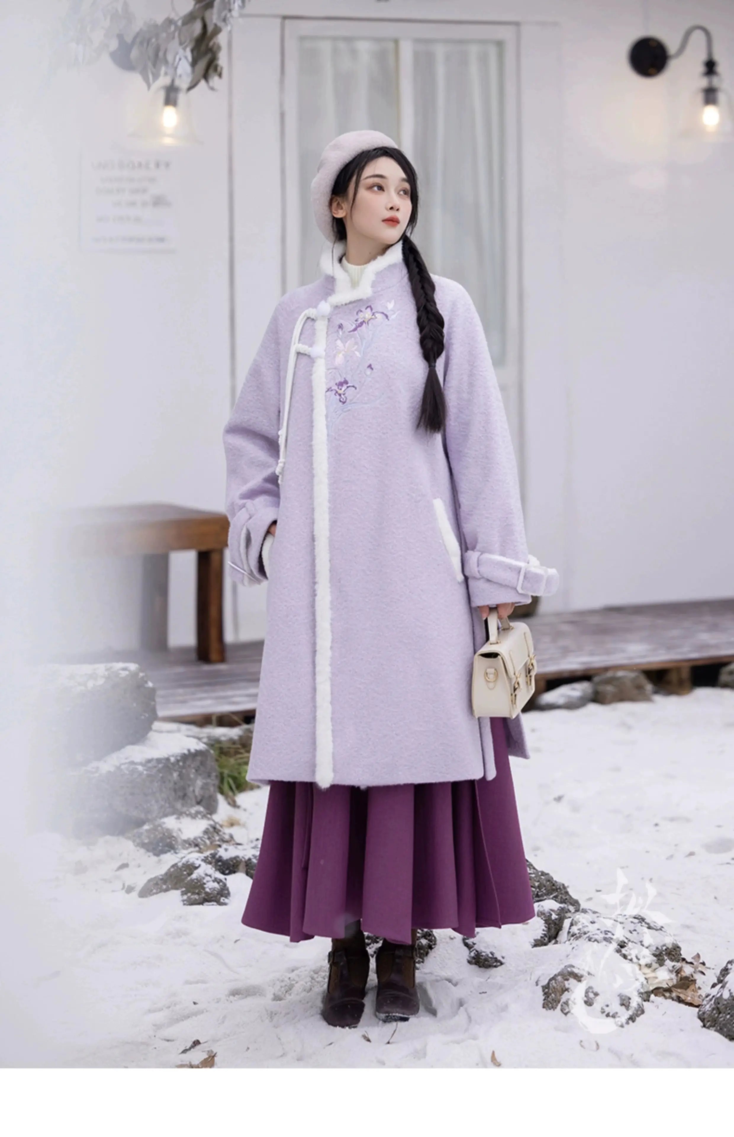 Model in purple Hanfu coat, snow falling