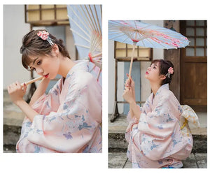 Collage of a woman in a pink yukata kimono with crane and floral patterns, posing with a parasol in a traditional Japanese setting.