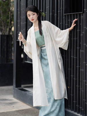 This blue modern hanfu features elegant hanfu sleeves, a stylish hanfu jacket, and timeless charm. Perfect for a princess hanfu dress, fairy hanfu dress, or casual hanfu, it suits every hanfu woman. Layer with a hanfu shirt or wear as a modern hanfu dress, inspired by Ming Dynasty hanfu. Ideal for hanfu cosplay or as a cozy winter hanfu, it’s available at our trusted hanfu shop. Wondering where to buy hanfu? Start here for authentic styles.