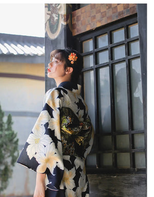 Side view of a Japanese kimono dress with a floral pattern, styled with a traditional obi belt, perfect for festivals and celebrations.