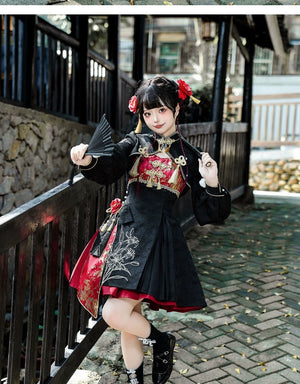 Black bolero jacket from the Lolita cheongsam suspender skirt set, featuring gold embroidery, puffed sleeves, and tassel details for a refined touch.