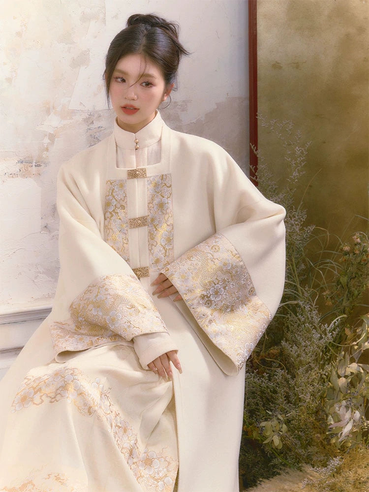 Stylish white hanfu cloak and modern Chinese New Year clothes for women, featuring elegant qipao and cheongsam coats perfect for festive celebrations and traditional attire