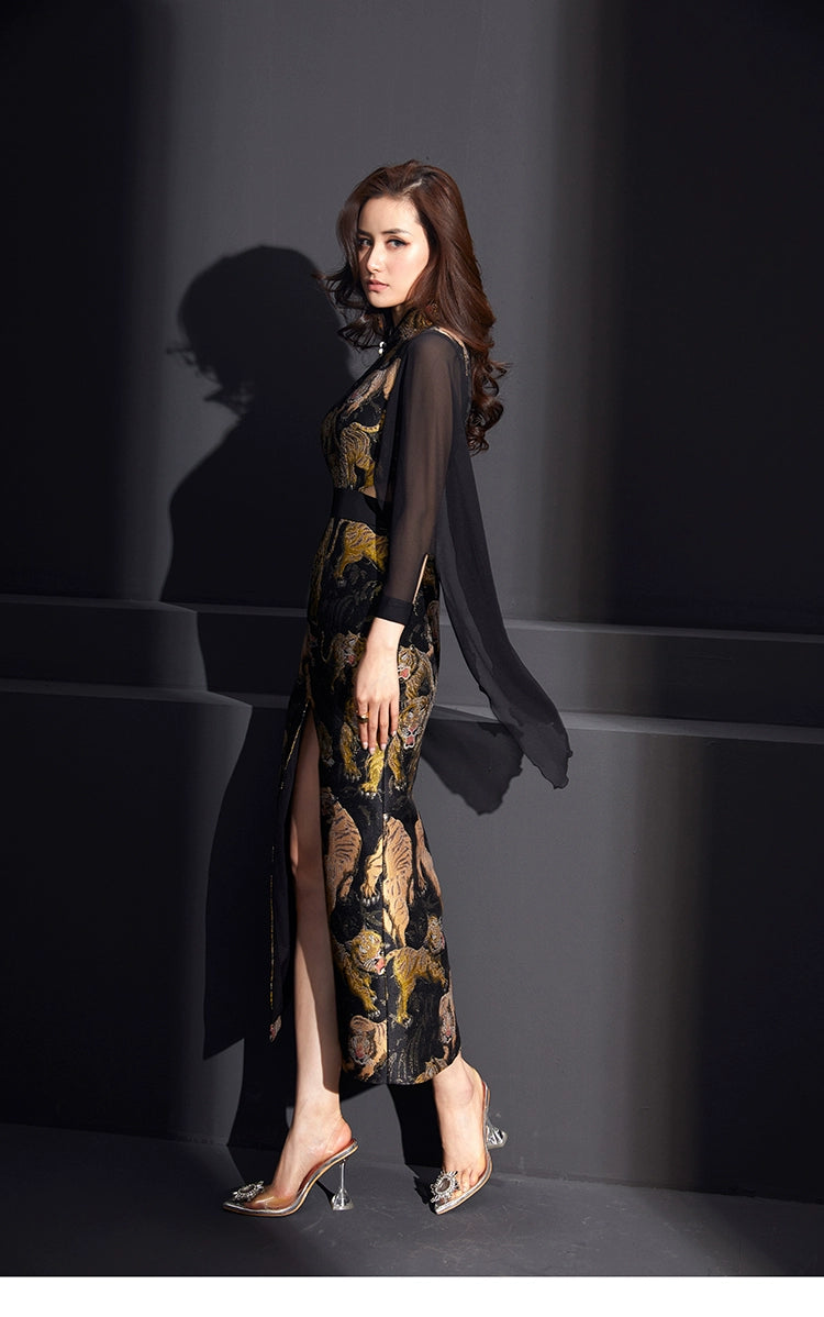 Side profile of satin cheongsam with tiger jacquard and sheer sleeves.