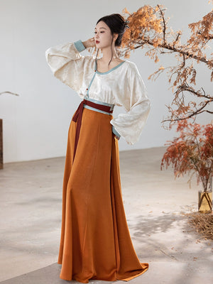 This orange modern hanfu features elegant hanfu sleeves, a stylish hanfu jacket, and timeless Ming Dynasty hanfu charm. Perfect as a princess hanfu dress, fairy hanfu dress, or casual hanfu, it’s great for hanfu cosplay or as a warm winter hanfu. Pair with a hanfu shirt or wear it as a modern hanfu dress. Shop authentic orange hanfu at our trusted hanfu shop, offering modernised hanfu and styles from the best Chinese designer clothing websites and modern Chinese clothes collections.