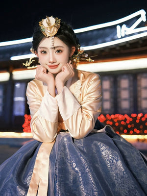 Yanji Korean Hanbok with a royal court aesthetic, blending traditional elegance with modern charm in a stunning blue and gold ensemble.