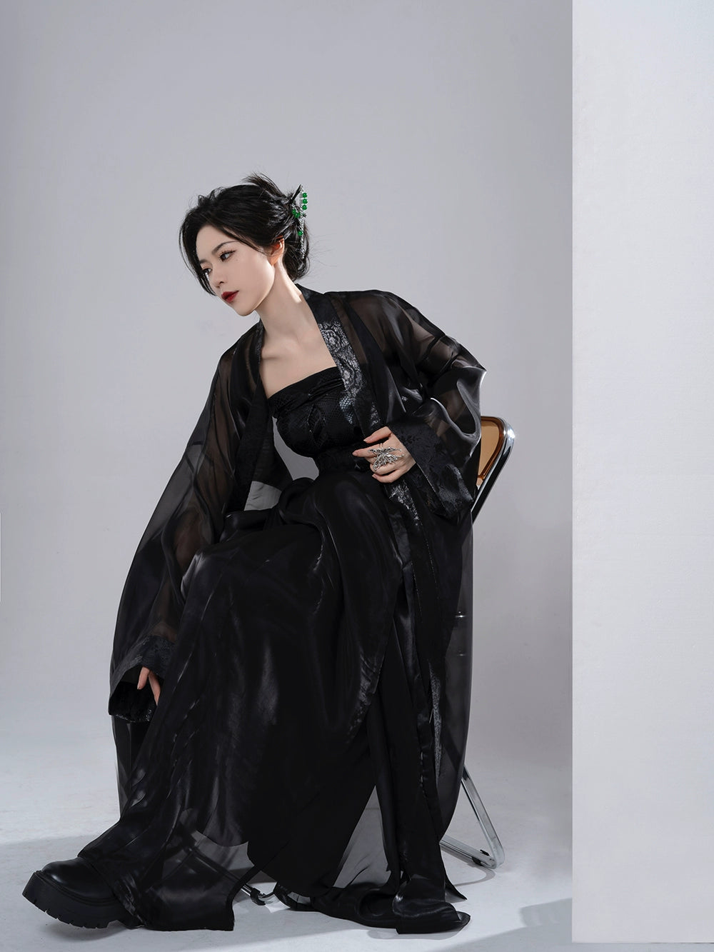 Embrace timeless style with our Song Dynasty-inspired Summer Hanfu ensemble in sleek black. Explore our collection of black Hanfu attire, including dresses, tops, and skirts, designed for modern comfort and traditional elegance. Elevate your wardrobe with our versatile Hanfu pieces, perfect for any occasion. Discover the beauty of Hanfu fashion and make a statement with our captivating black ensemble.