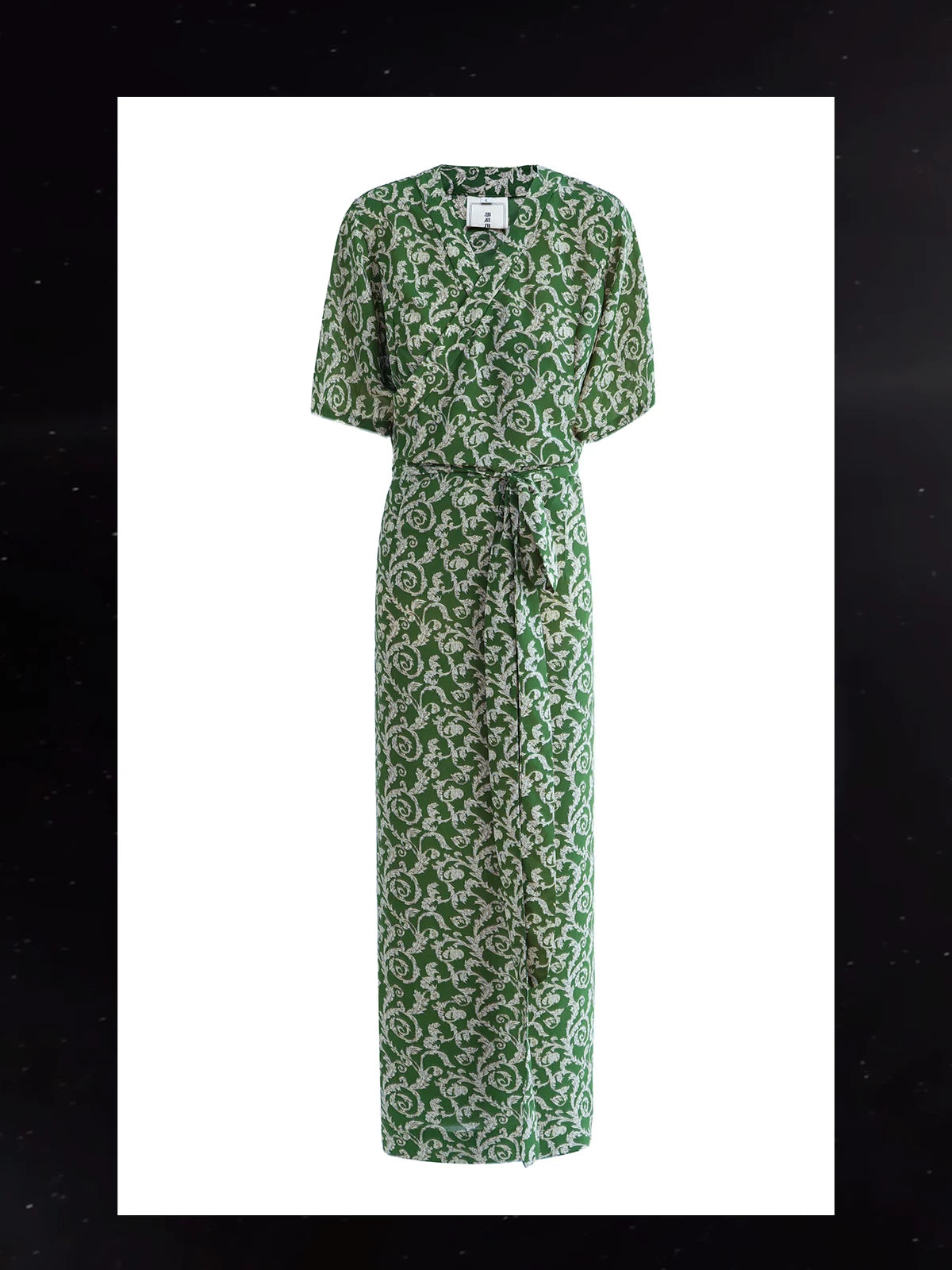 Elegant green ethnic dress with soft chiffon drape and summer styling