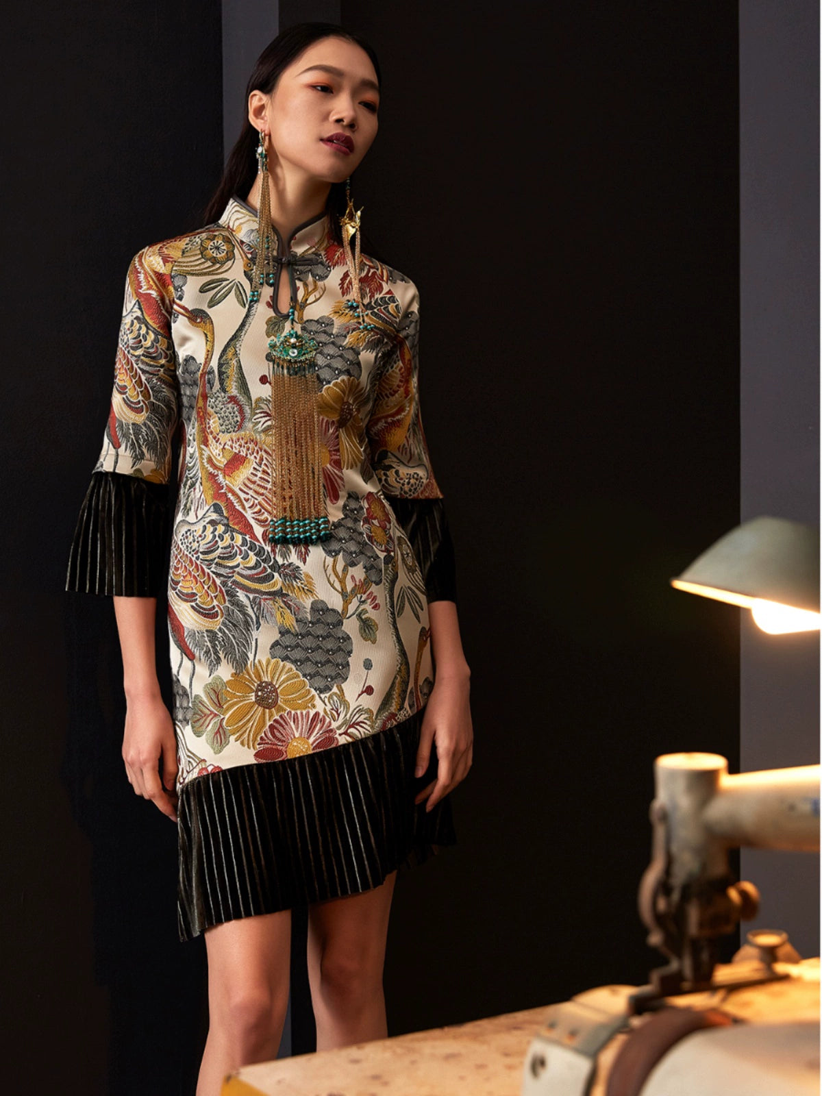 Retro cheongsam dress with jacquard floral patterns and velvet accents.