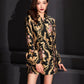 Refined jacquard Cheongsam blazer dress with bold gold and floral brocade.