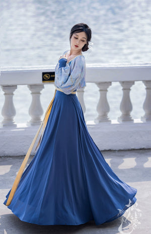 This blue modern hanfu features elegant hanfu sleeves, a stylish hanfu jacket, and timeless charm. Perfect for a princess hanfu dress, fairy hanfu dress, or casual hanfu, it suits every hanfu woman. Layer with a hanfu shirt or wear as a modern hanfu dress, inspired by Ming Dynasty hanfu. Ideal for hanfu cosplay or as a cozy winter hanfu, it’s available at our trusted hanfu shop. Wondering where to buy hanfu? Start here for authentic styles.