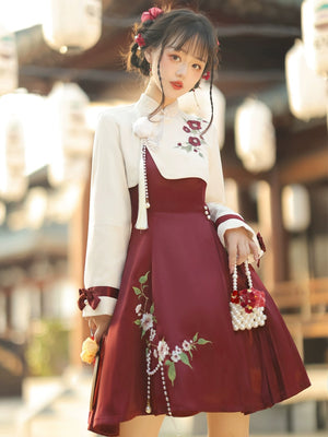 Elegant Camellia Lolita cheongsam with cream top and burgundy skirt featuring floral embroidery and pearl tassel details.