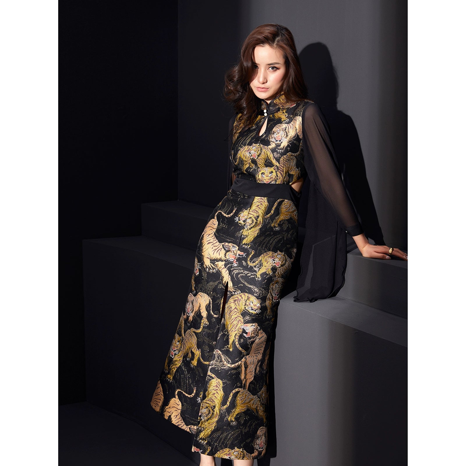 Retro-style cheongsam featuring Ukiyo-e tiger pattern and sheer sleeves.