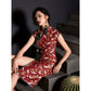 Stylish red cheongsam with crane design, showcasing a chic split skirt.