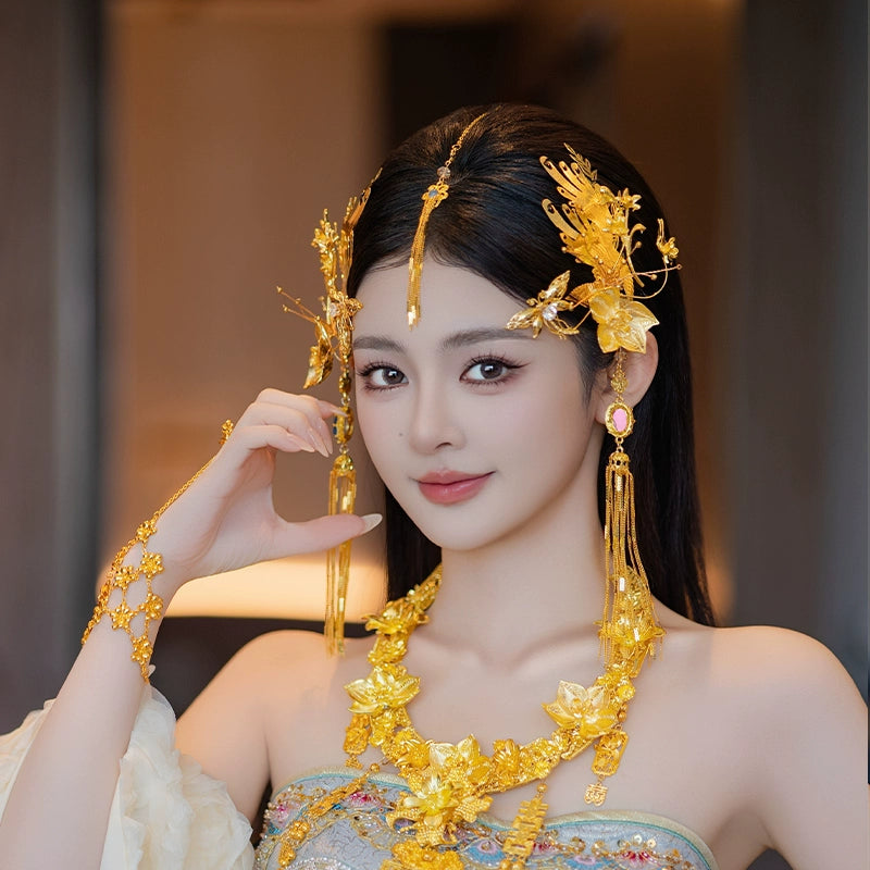 Chinese dragonfly hairpin with gold fringe and floral accents, styled for bridal engagement cheongsam looks.