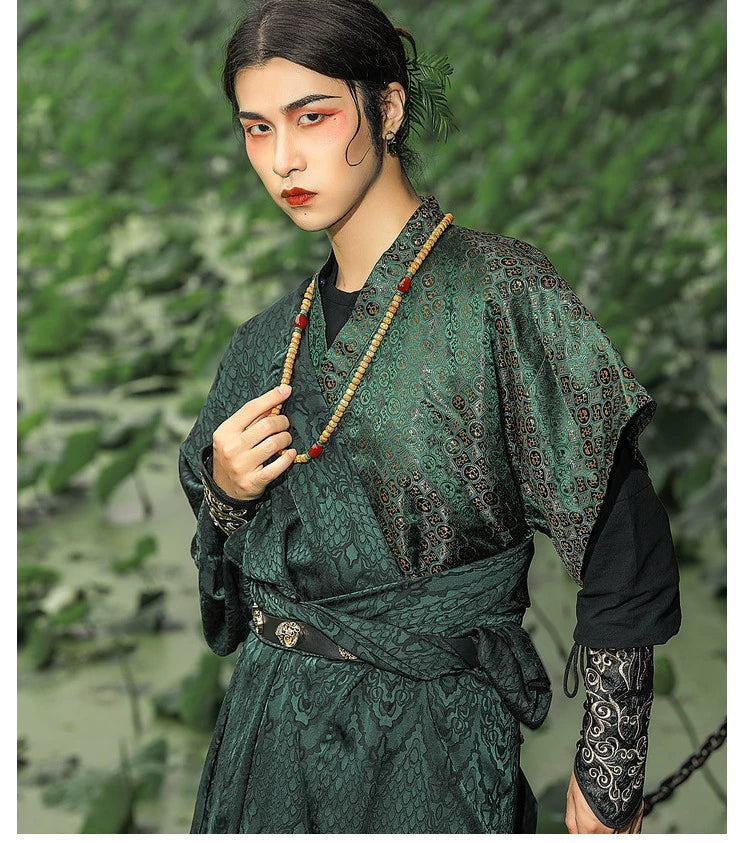 Elevate your style with our Tang Dynasty-inspired Round Collar Robe Hanfu. Crafted with attention to detail, this modern interpretation features a stylish round collar and half-arm design, perfect for men and women alike. Explore the timeless charm of ancient Chinese fashion with our green Hanfu ensemble.