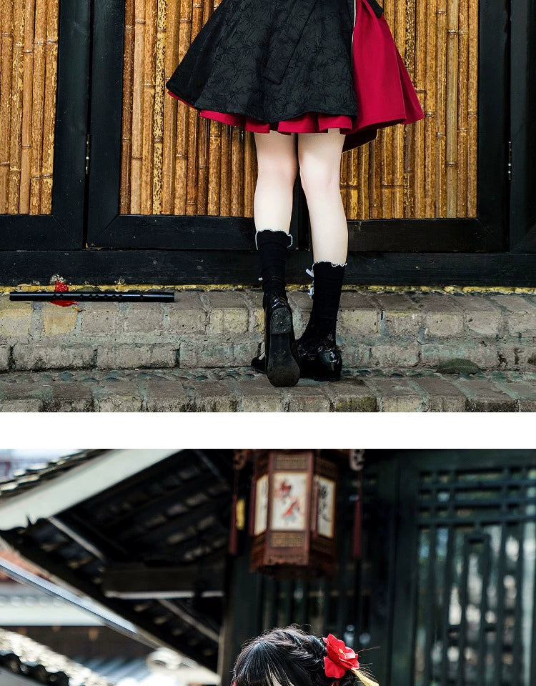 Matching leg accessories from the Lolita cheongsam suspender skirt set, featuring black and red fabric with gold embroidery and tassel details.