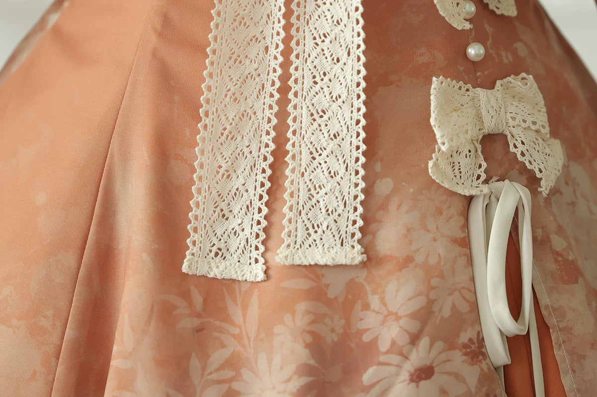 Fixed waist bows and decorative cord on the peach dress