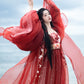 Step into the opulent world of Tang Dynasty elegance with our exquisite Red Hanfu Ensemble. Featuring a chest-length wrap skirt adorned with intricate super fairy embroidery and paired with a flowing large-sleeved top suit, our ensemble captures the essence of Tang Dynasty grandeur and sophistication. Embrace the rich heritage and timeless beauty of ancient Chinese fashion with our stunning collection.