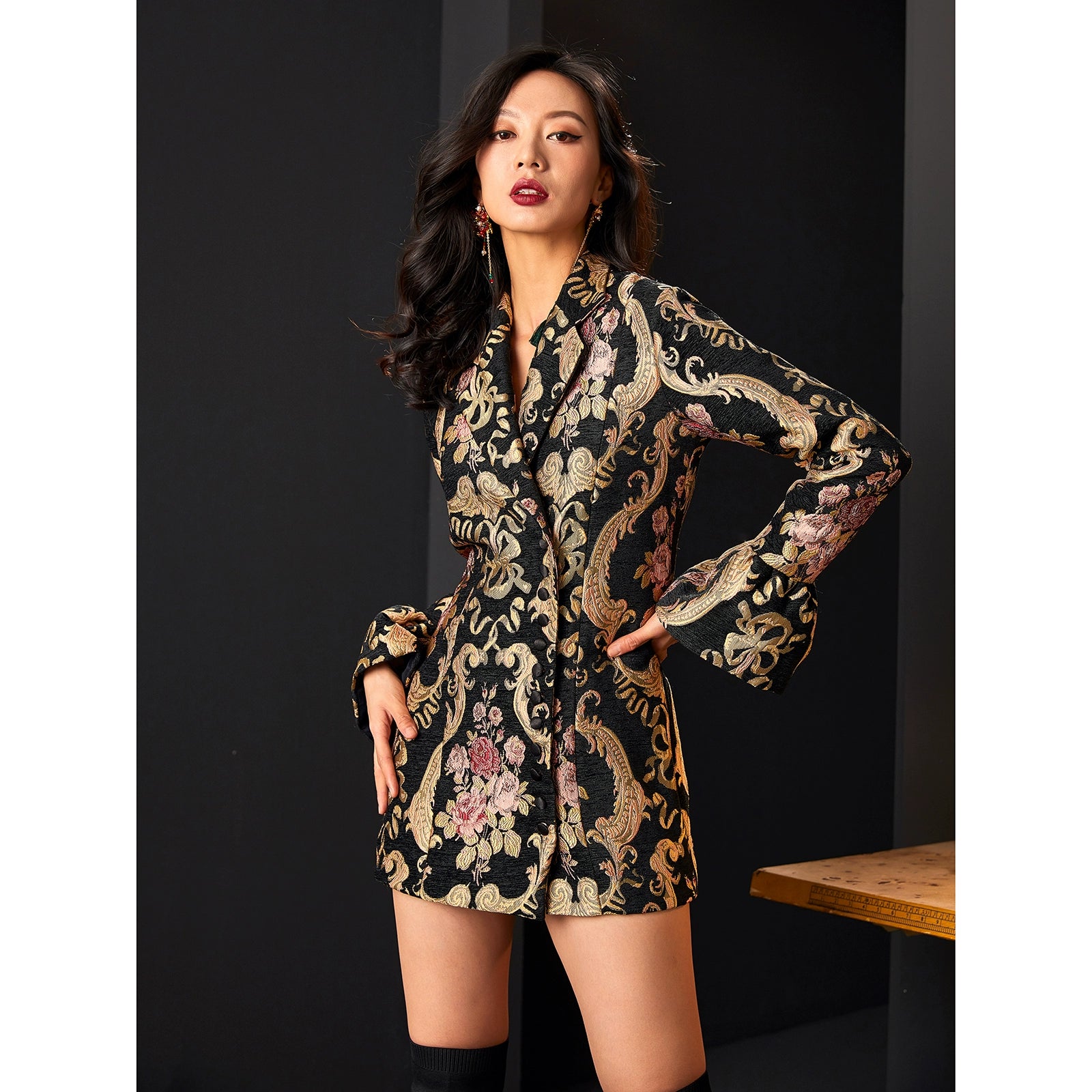 Elegant black and gold jacquard OL jacket with floral accents.