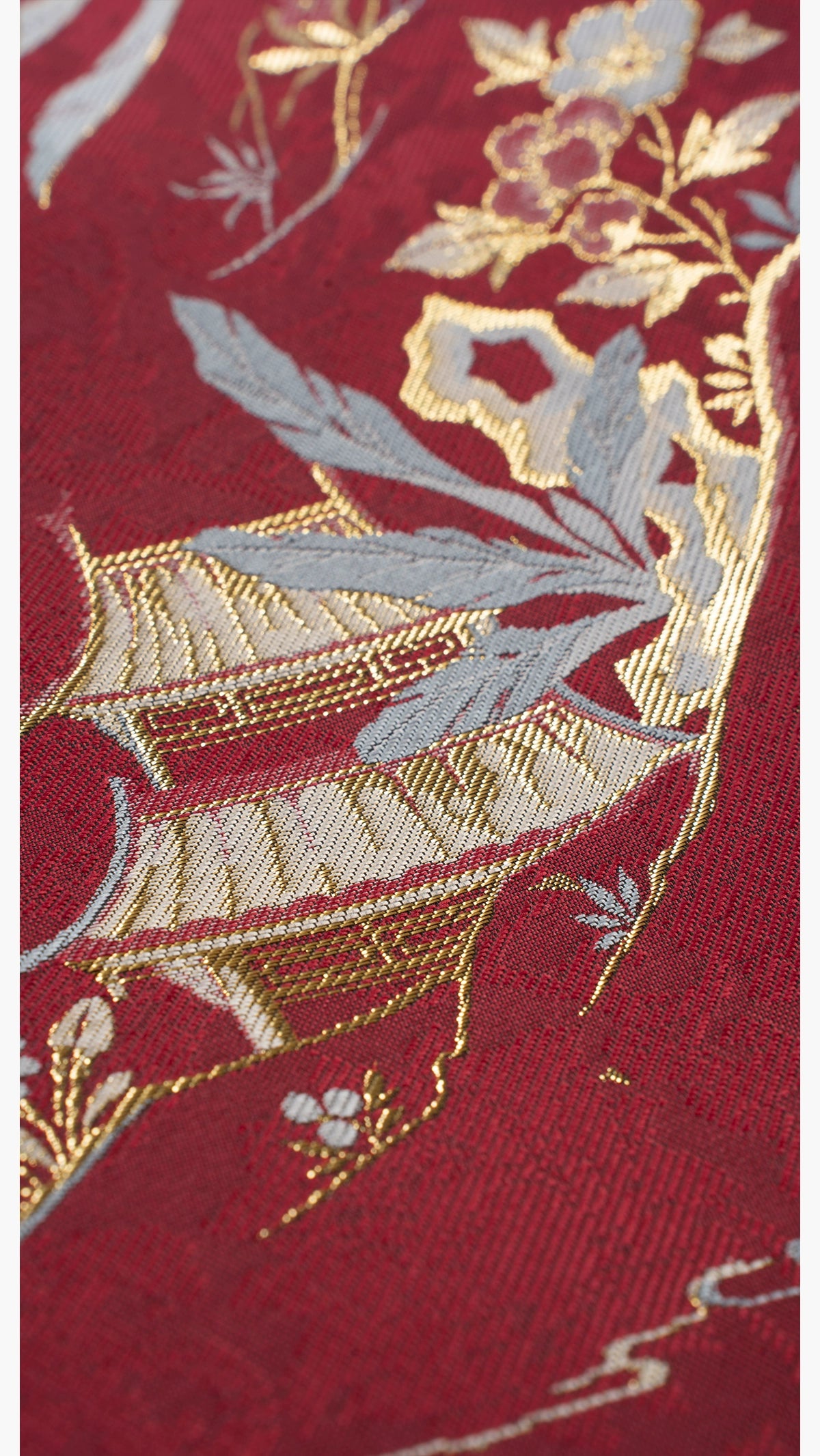 Close-up of bamboo and floral embroidery on [Dan Que Acacia] New Chinese Style Red Wedding Dress fabric.