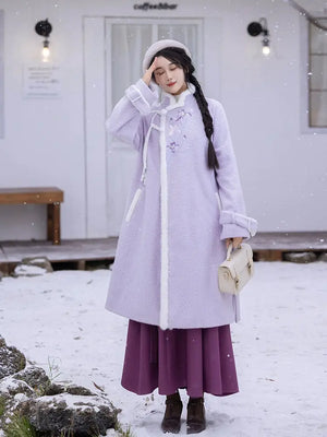 Model in purple Hanfu coat and skirt, snowy background