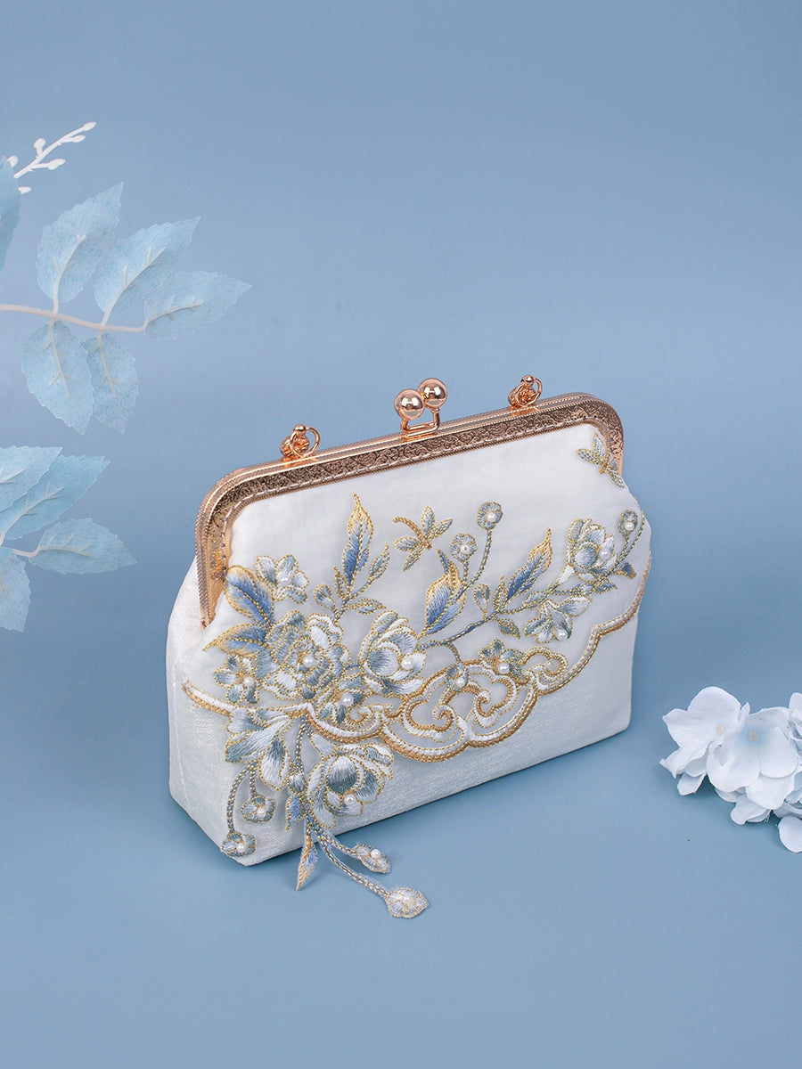 Elegant Yuejian white Hanfu bag with gold floral embroidery and a vintage clasp, designed for traditional and formal wear.