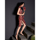 Side view of red cheongsam with crane print and high slit detail.